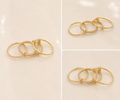 Anillo para Mujer en Oro 10K con Diseño de Aros y Piedras