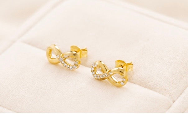 Aretes de Oro 10K con Diseño de Infinito y Detalles Brillantes
